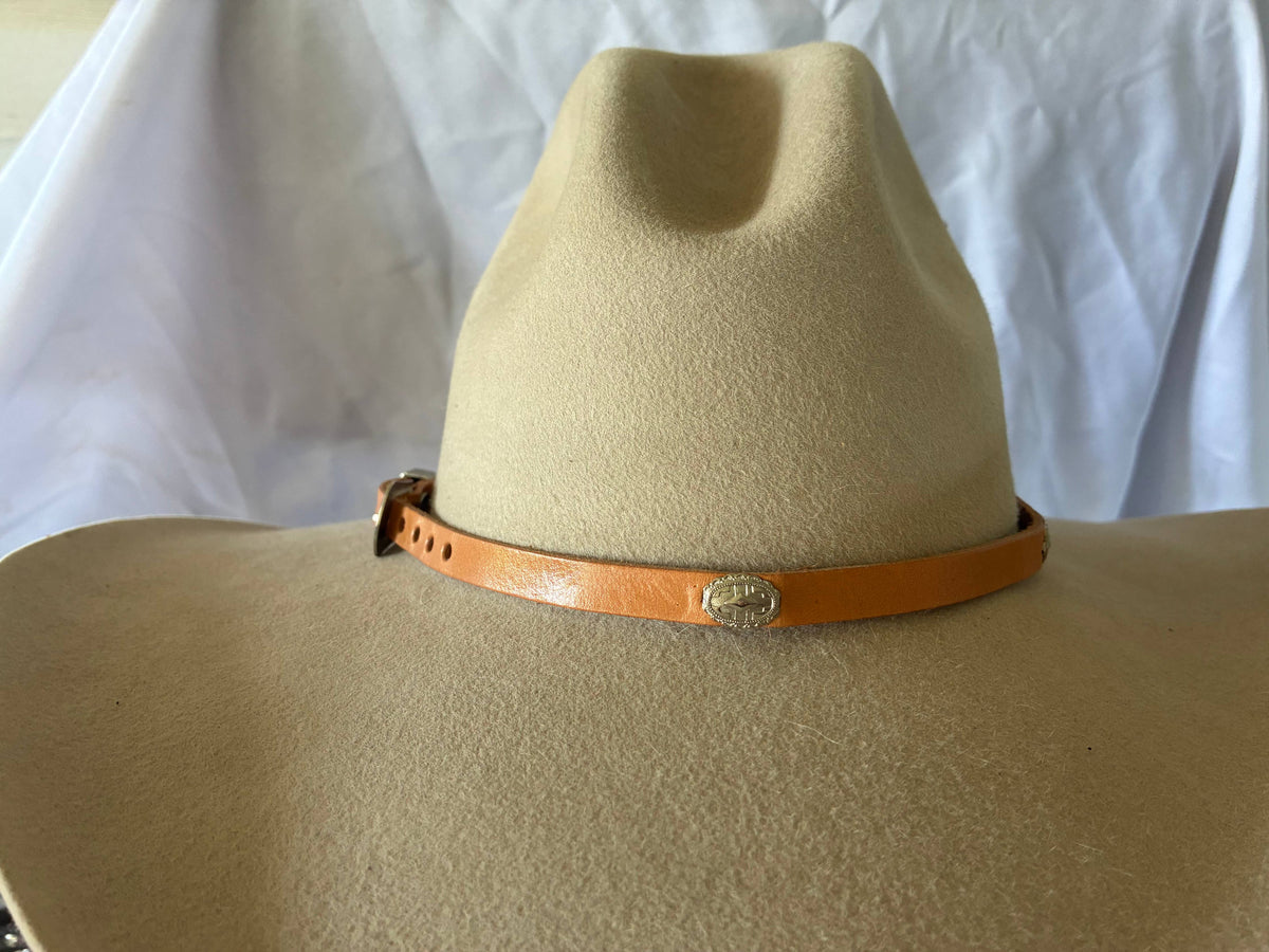 Adjustable tan leather hatband w/ silver 
Conchos & buckle