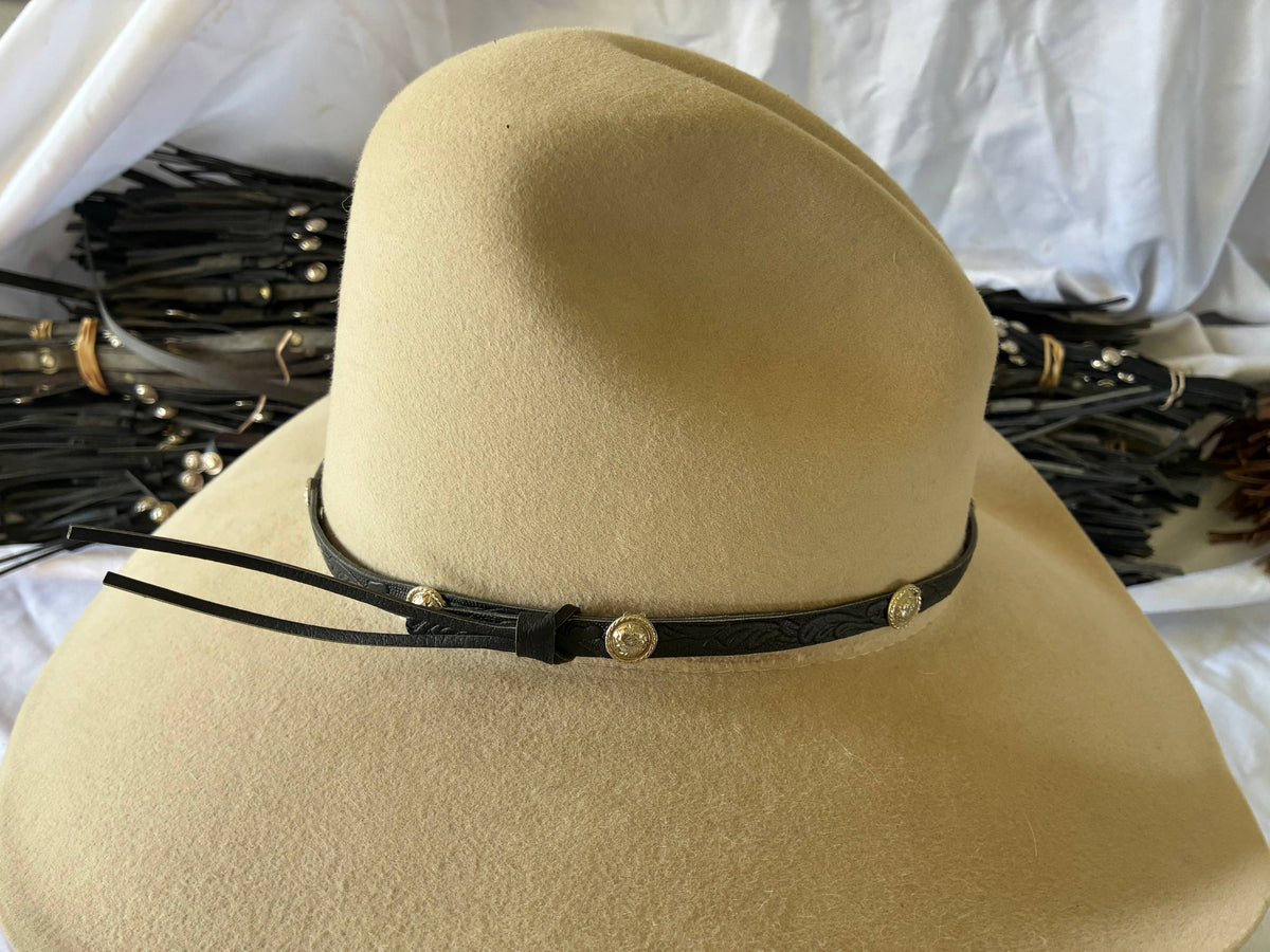 Adjustable black leather hatband with silver conchos